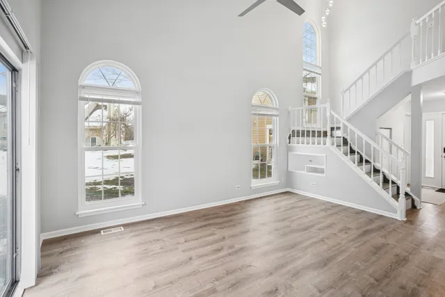 a view of an entryway with wooden floor