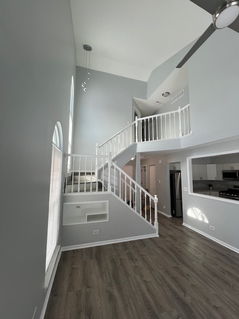 267 Cobblestone Court, Unit 267 Schaumburg, IL 60173 - Photo 6 of 19 a view of an entryway with wooden floor