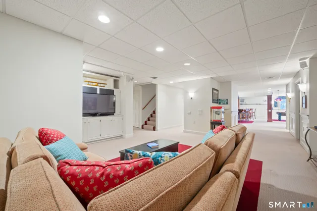 a bed room with a bed and a night stand