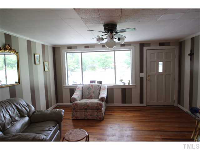 13249 Social Plain Road Middlesex, NC 27557 - Photo 4 of 11 Living room with hardwood floors