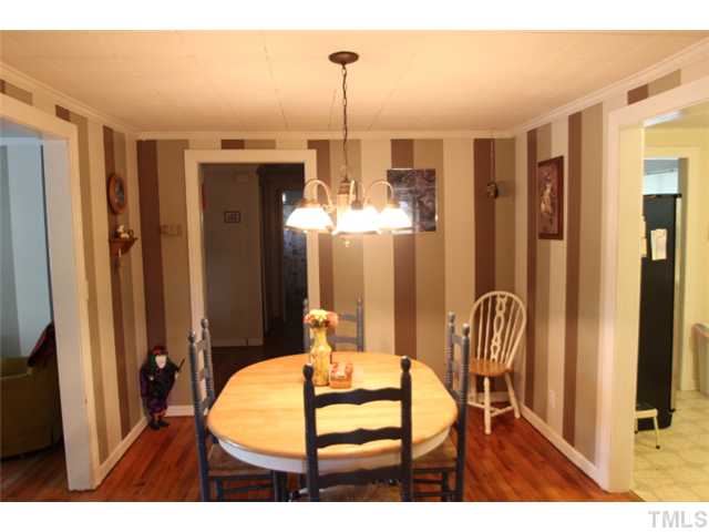 13249 Social Plain Road Middlesex, NC 27557 - Photo 6 of 11 Dining room with hardwood floors