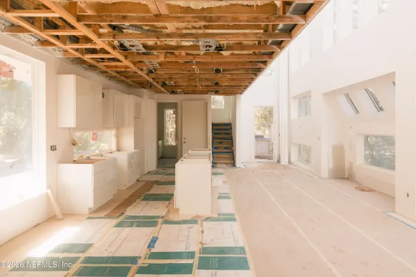 a bathroom with a tub and shower