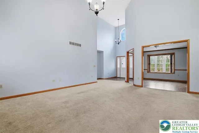 a kitchen with stainless steel appliances granite countertop a stove sink microwave and cabinets