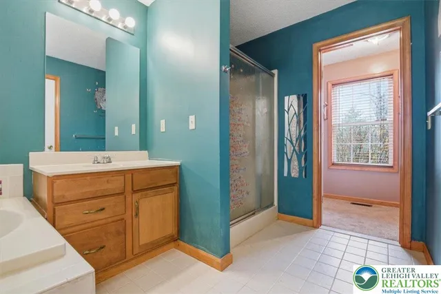 a view of storage and utility room with stairs