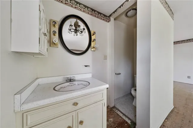 an empty room with a empty space and windows