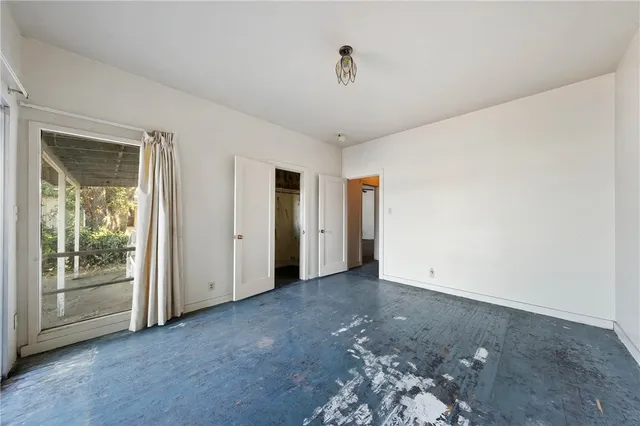 swimming pool view with a seating space