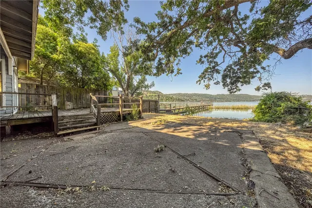 a view of a backyard of the house