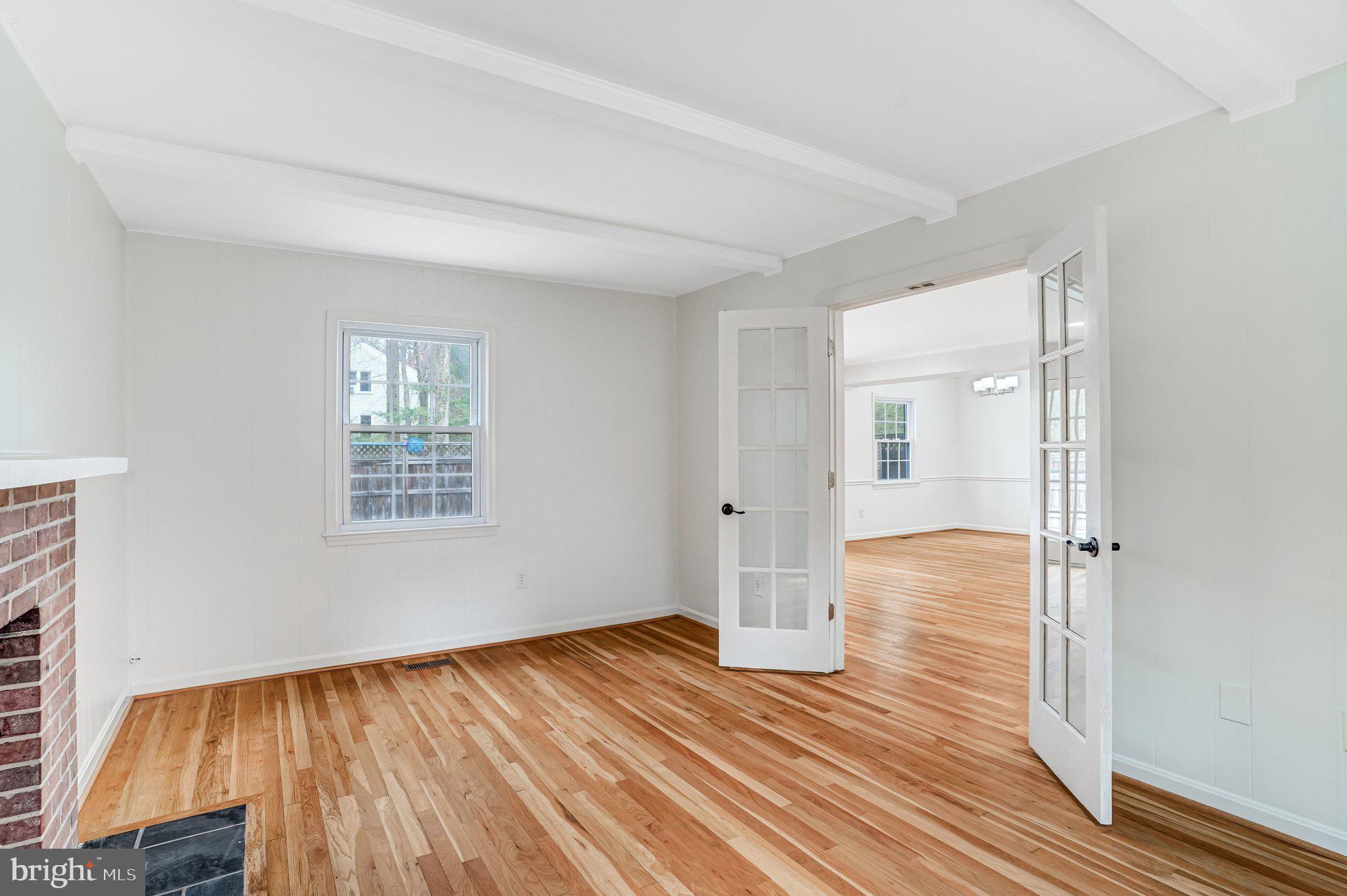 9752 Cardinal Road Fairfax, VA 22030 - Photo 13 of 37 wooden floor in an empty room with a window