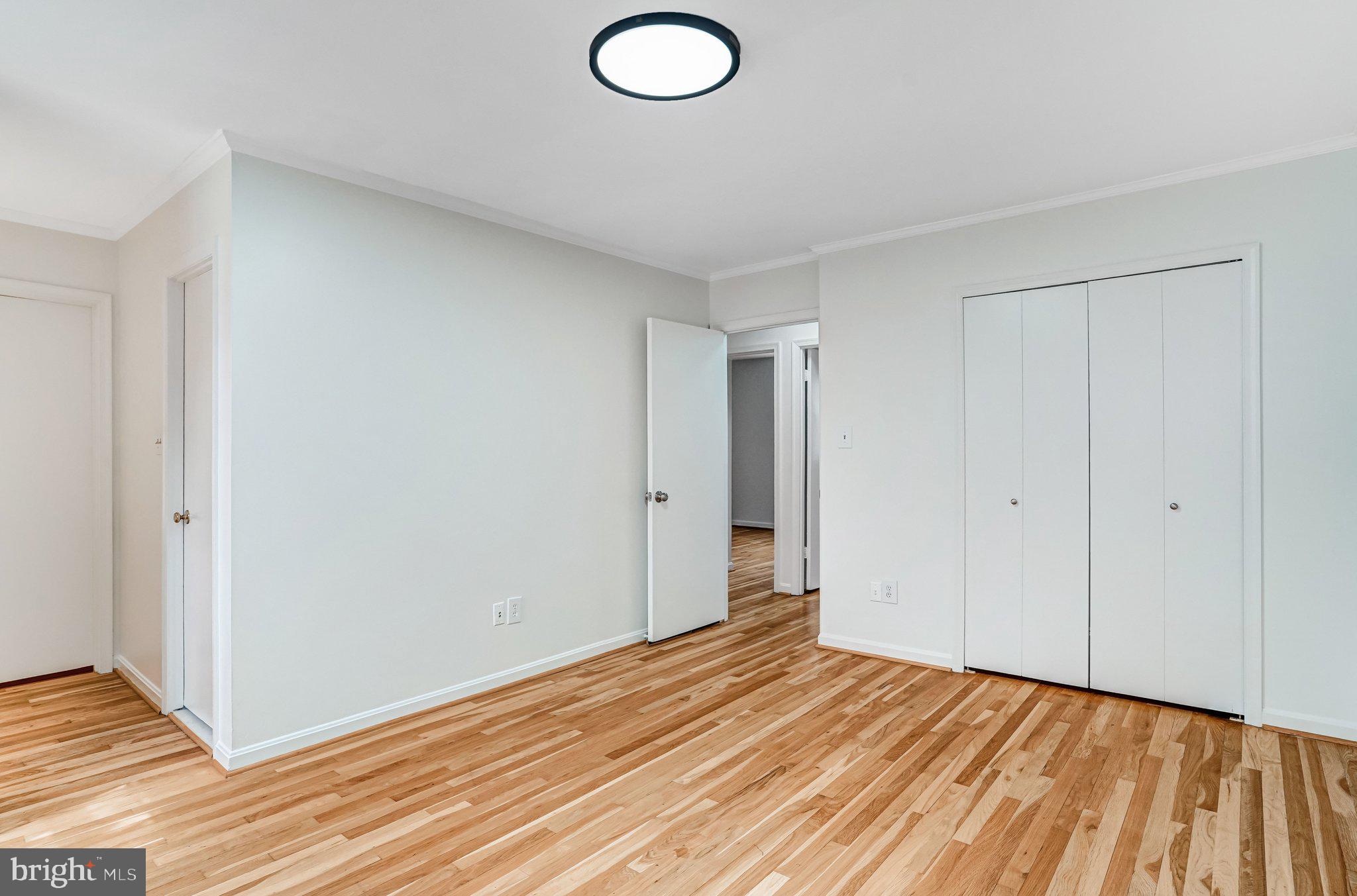 9752 Cardinal Road Fairfax, VA 22030 - Photo 16 of 37 a view of a room with wooden floor and bathroom
