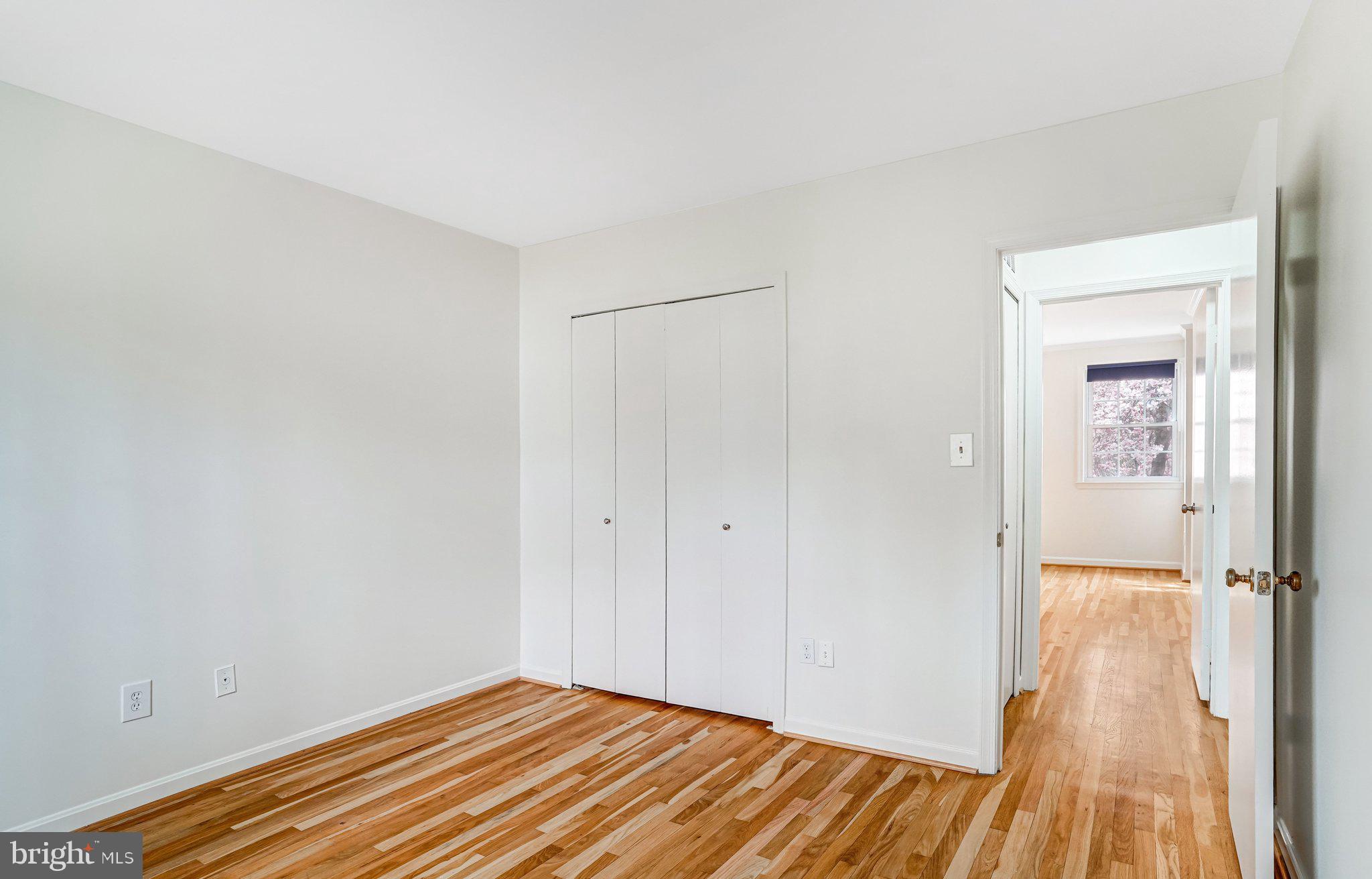 9752 Cardinal Road Fairfax, VA 22030 - Photo 21 of 37 a view of a room with wooden floor and a bathroom