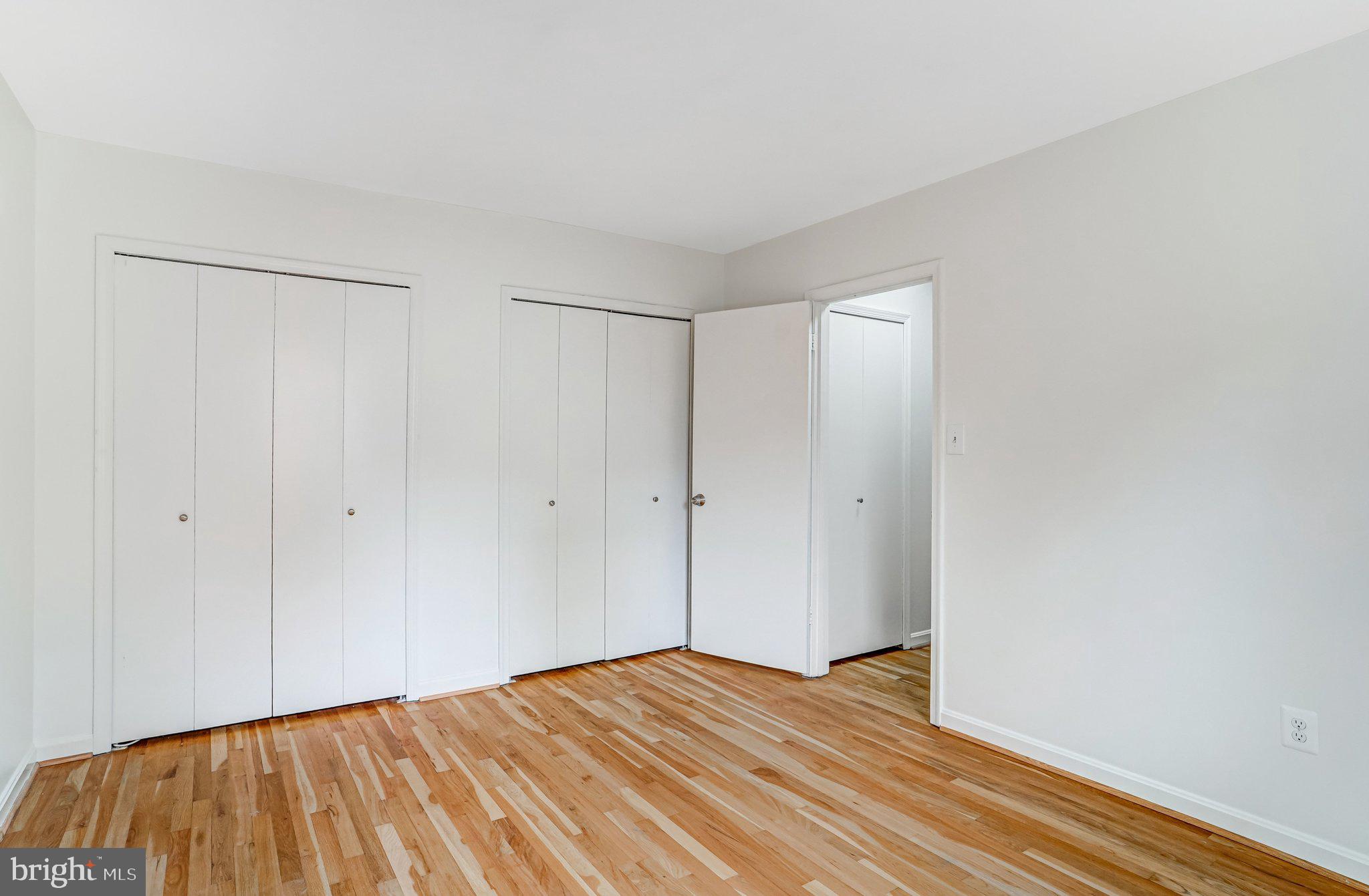 9752 Cardinal Road Fairfax, VA 22030 - Photo 25 of 37 a view of a room with wooden floor