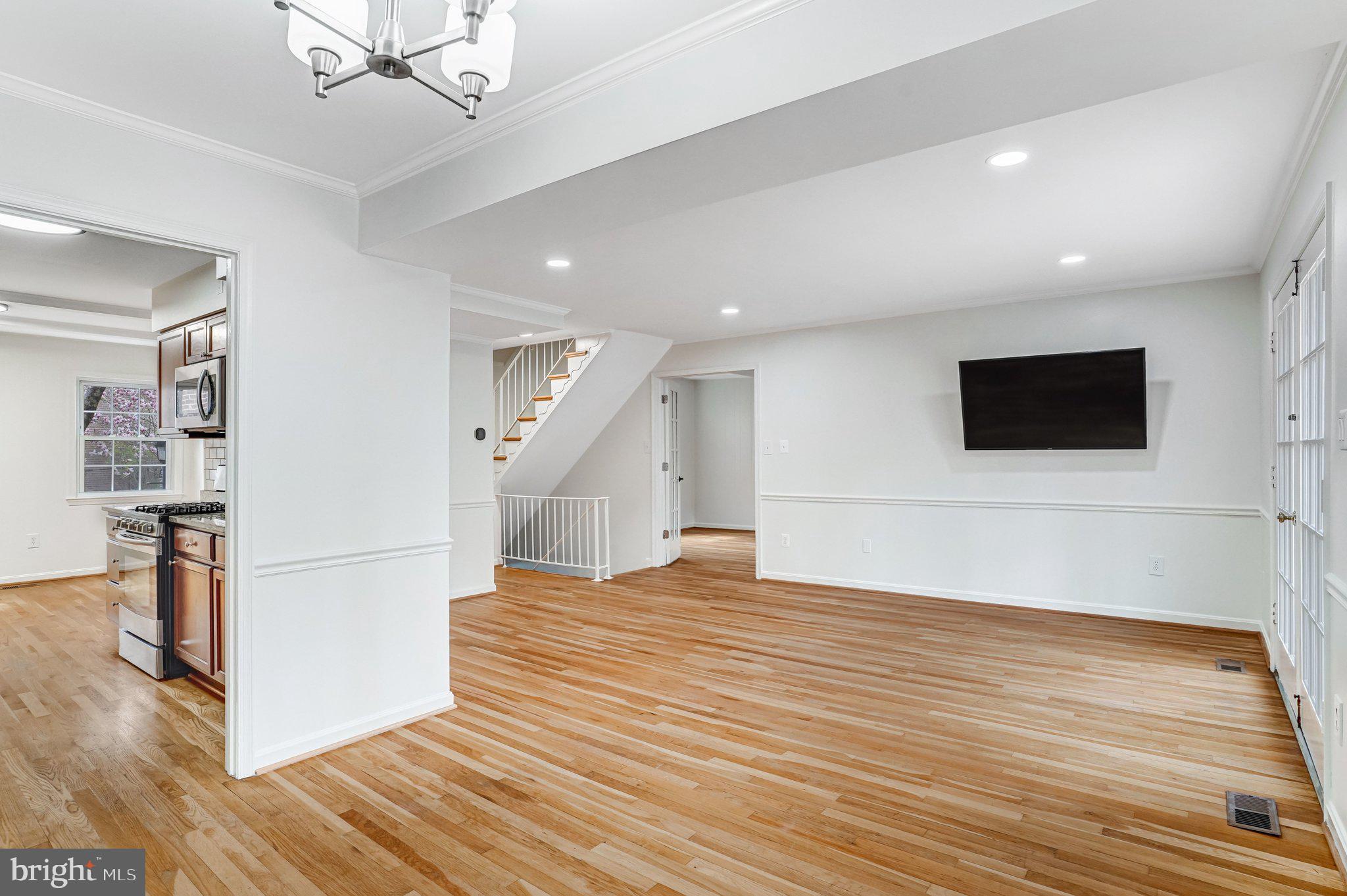 9752 Cardinal Road Fairfax, VA 22030 - Photo 9 of 37 a view of a livingroom with wooden floor