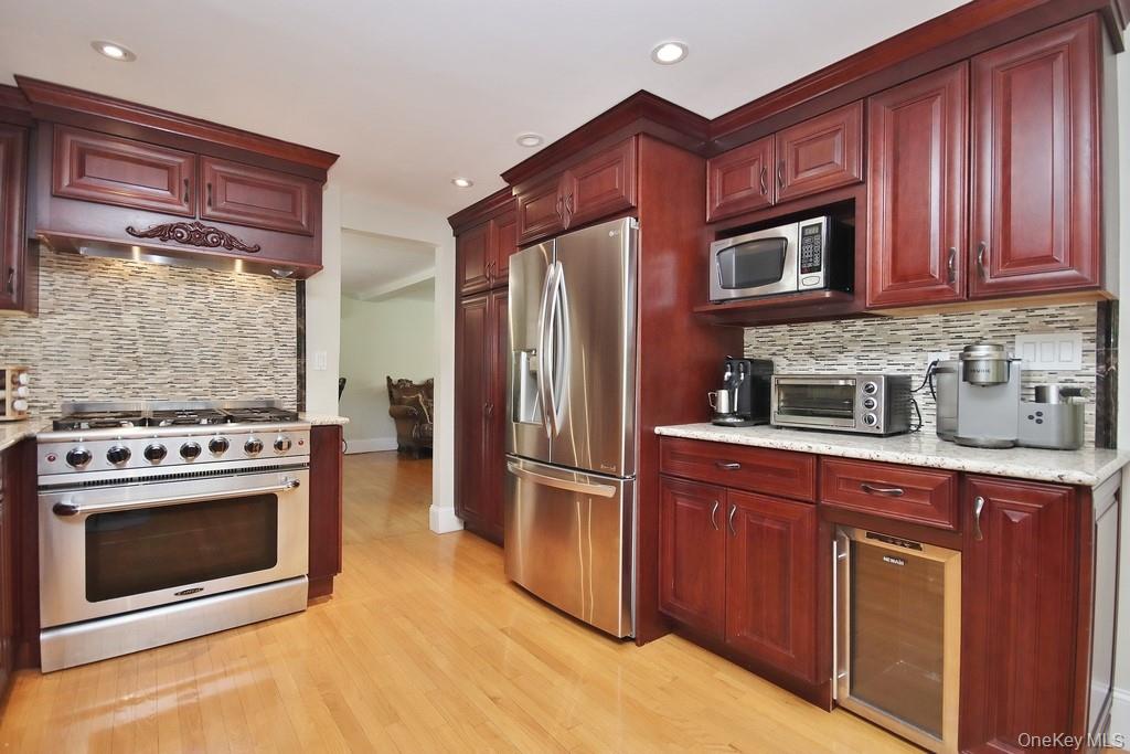 30 Granite Springs Road Granite Springs, NY 10527 - Photo 4 of 37 a kitchen with stainless steel appliances granite countertop a stove microwave and refrigerator
