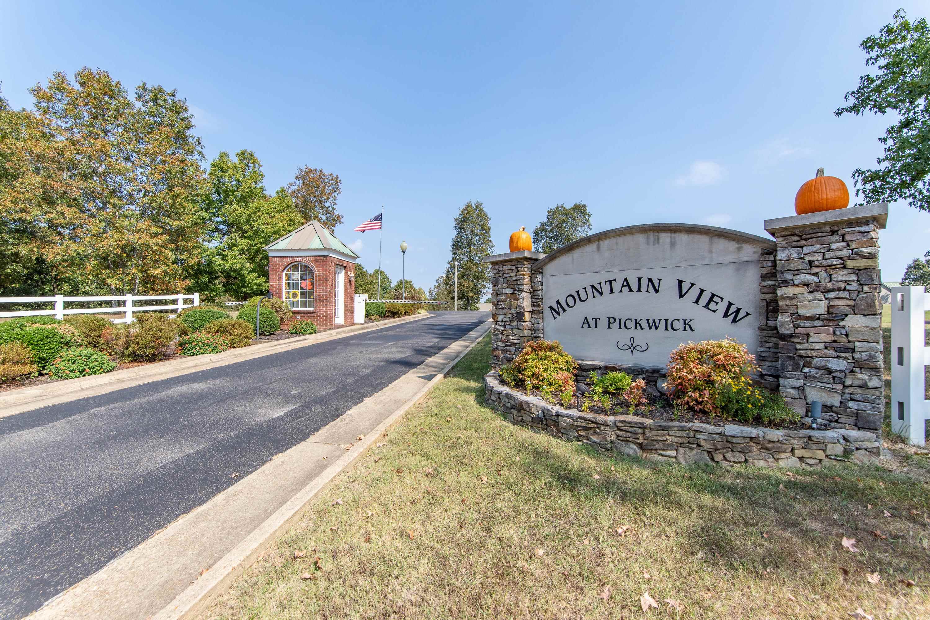 18 Mountain View Iuka, MS 38852 - Photo 38 of 40 a front view of a house with a garden and signage