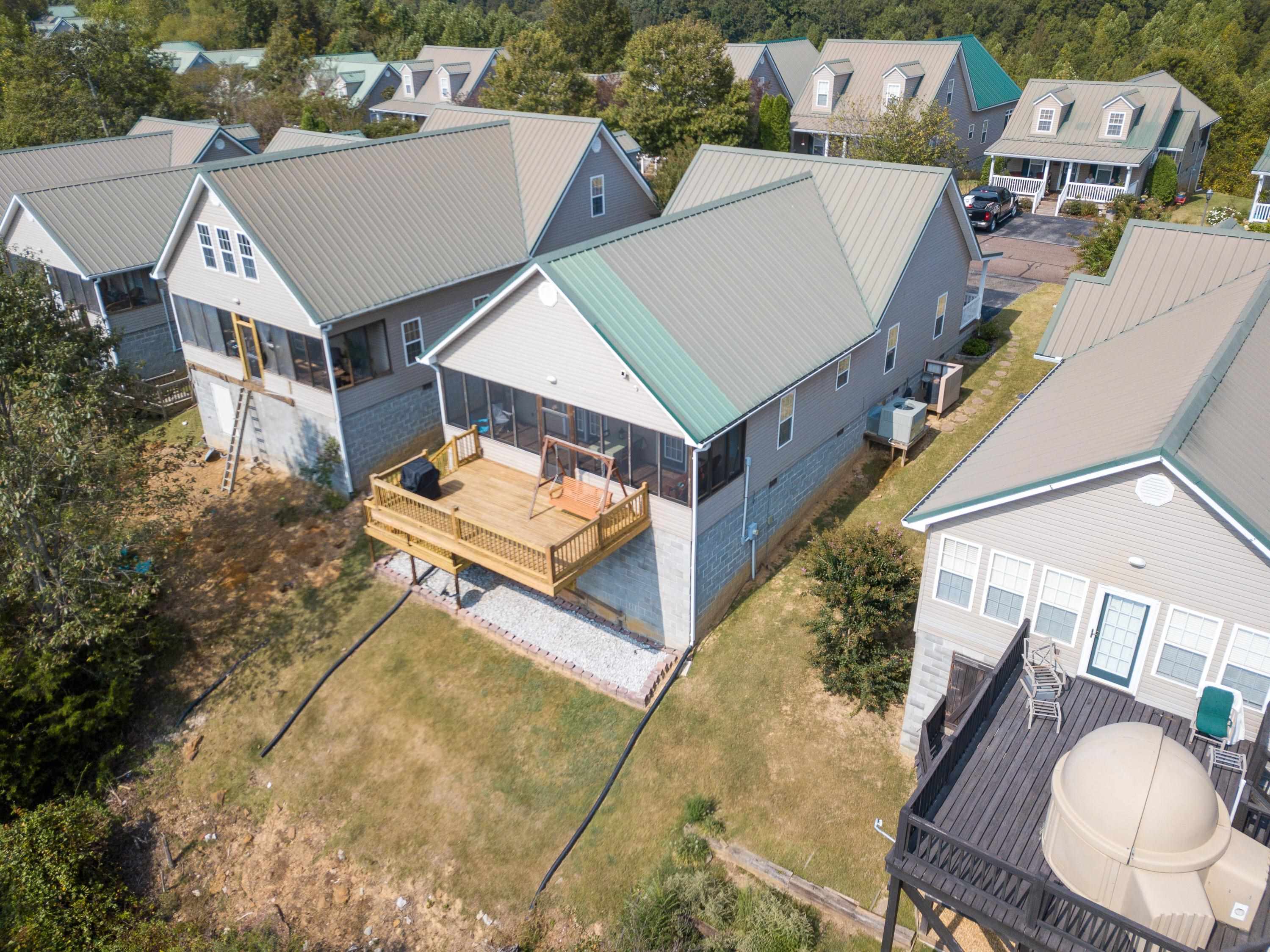 18 Mountain View Iuka, MS 38852 - Photo 8 of 40 an aerial view of a house with swimming pool and outdoor seating