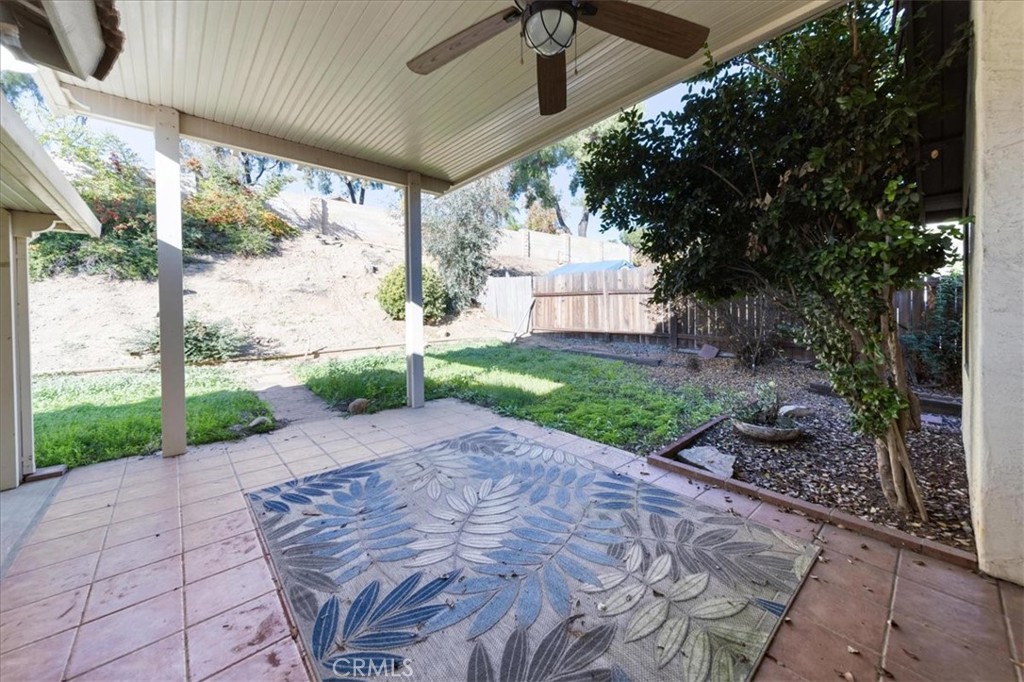 39739 Old Carriage Road Murrieta, CA 92563 - Photo 25 of 31 a sidewalk with a trees in front of it