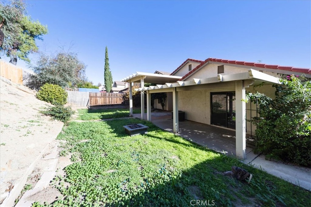39739 Old Carriage Road Murrieta, CA 92563 - Photo 27 of 31 a front view of a house with garden