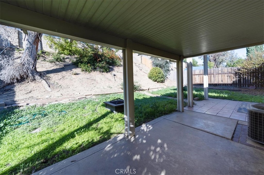 39739 Old Carriage Road Murrieta, CA 92563 - Photo 29 of 31 a view of a porch with a yard