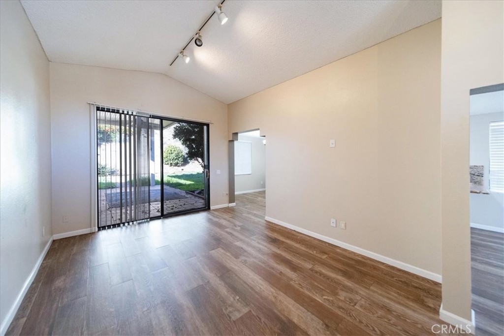 39739 Old Carriage Road Murrieta, CA 92563 - Photo 5 of 31 wooden floor in an empty room with a window