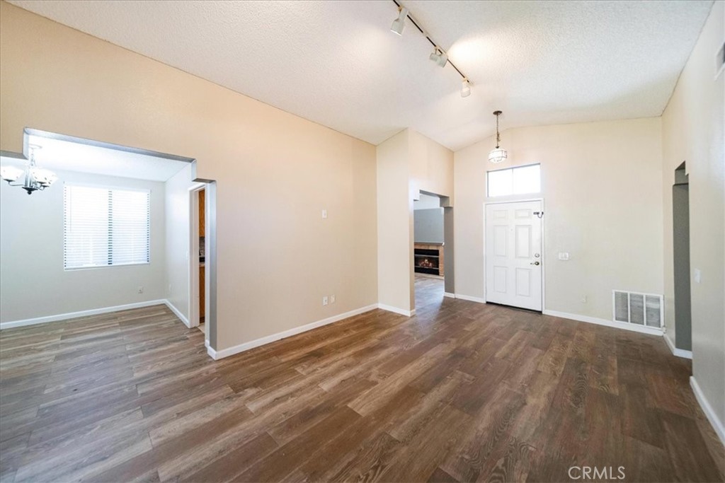39739 Old Carriage Road Murrieta, CA 92563 - Photo 7 of 31 a view of empty room with wooden floor