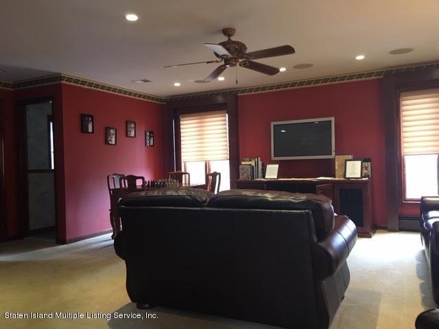 93 Romer Road Staten Island, NY 10304 - Photo 8 of 15 93 Romer Sitting Room with plasma screen