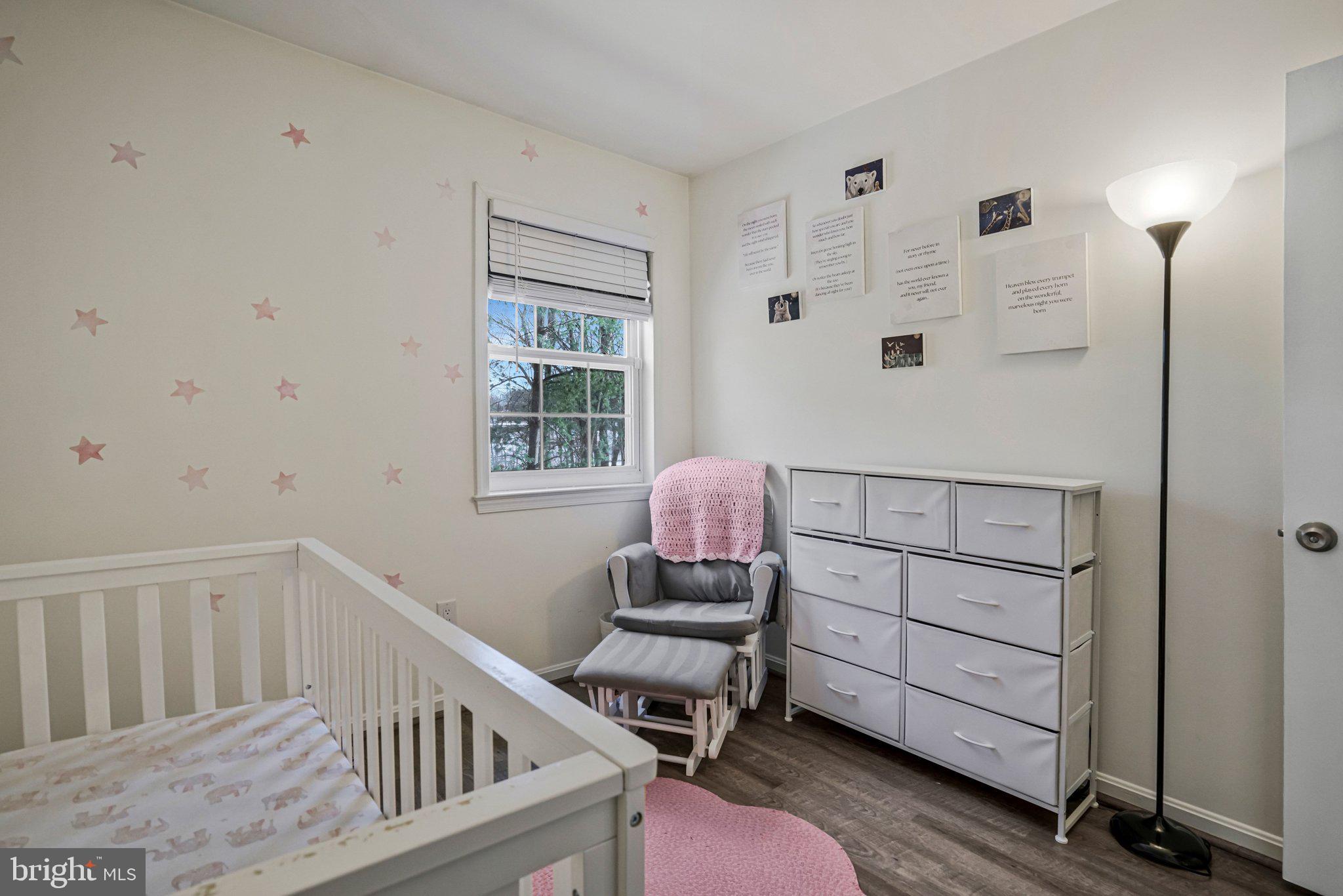 6064 Old Landing Way Burke, VA 22015 - Photo 22 of 38 a room with furniture and window