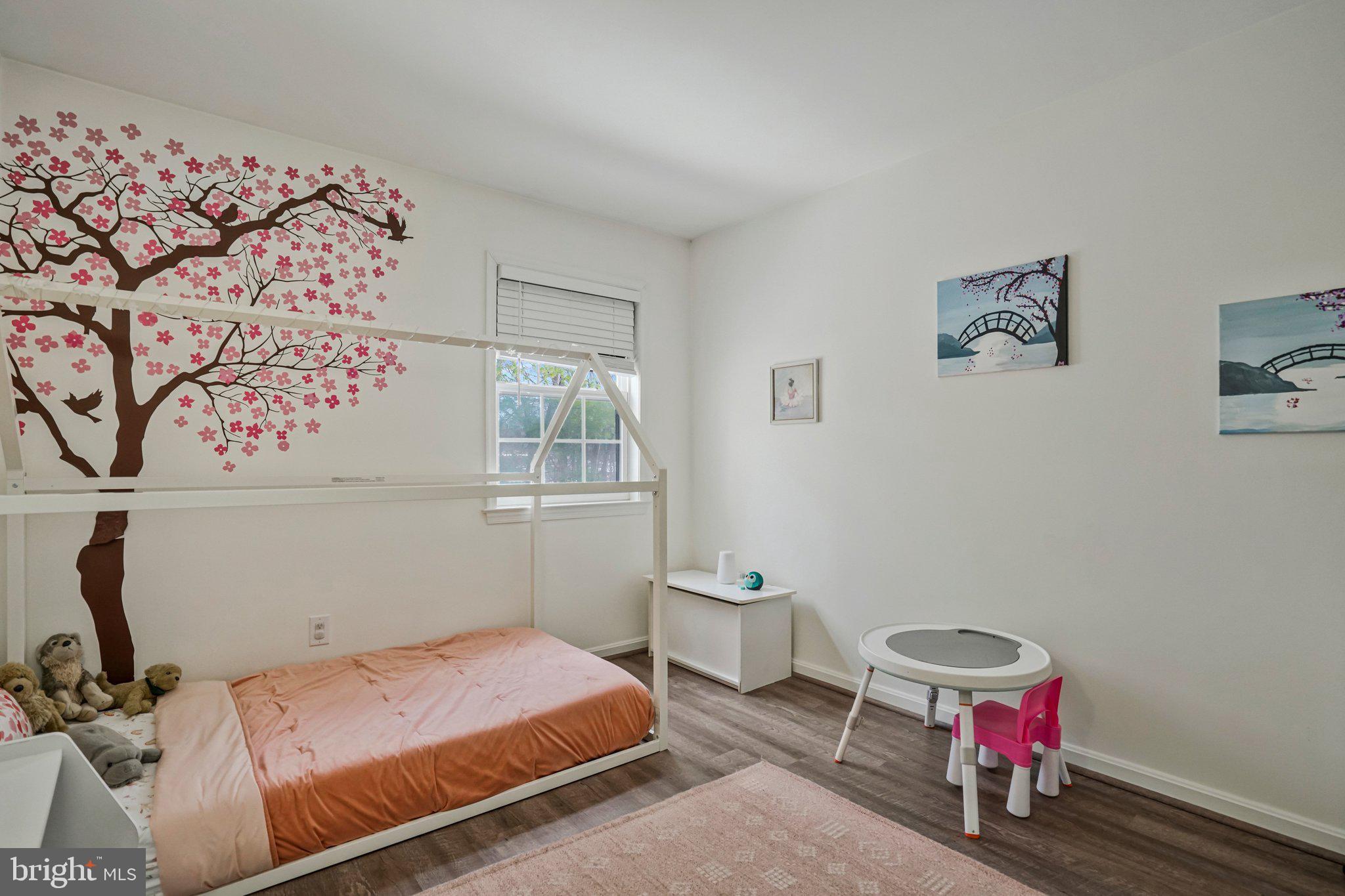 6064 Old Landing Way Burke, VA 22015 - Photo 25 of 38 a bedroom with a bed and a window