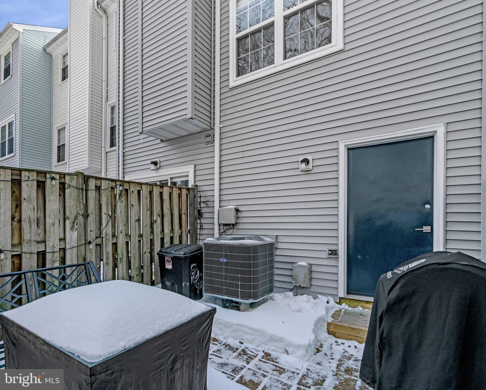 6064 Old Landing Way Burke, VA 22015 - Photo 31 of 38 a view of a dinning table and chairs in the patio