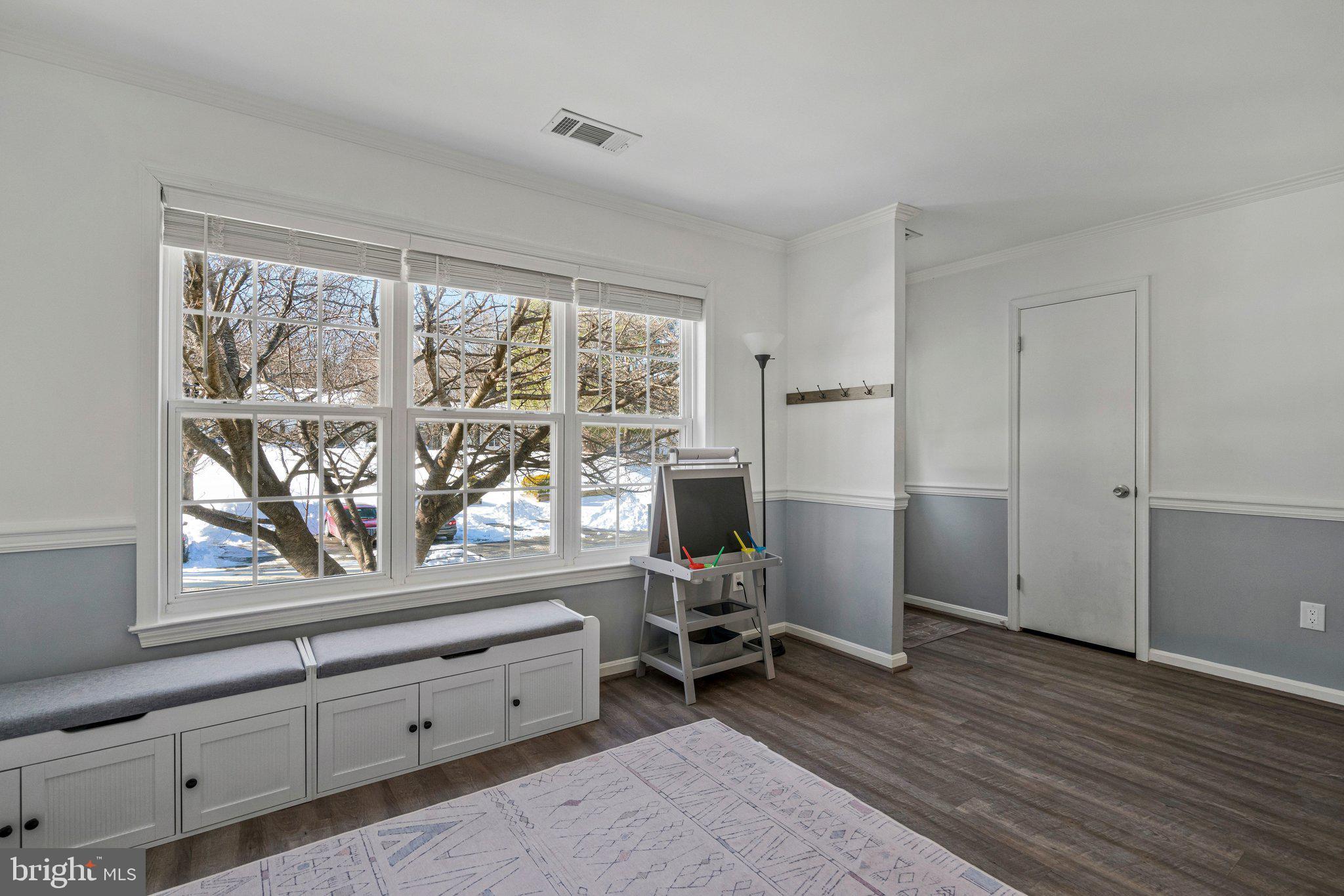 6064 Old Landing Way Burke, VA 22015 - Photo 5 of 38 a view of room with wooden floor and furniture