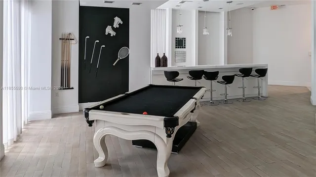 a room with furniture and a rug