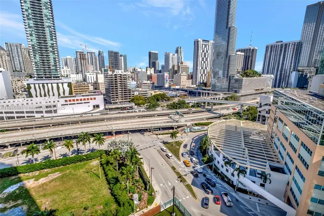 a view of a city with tall buildings
