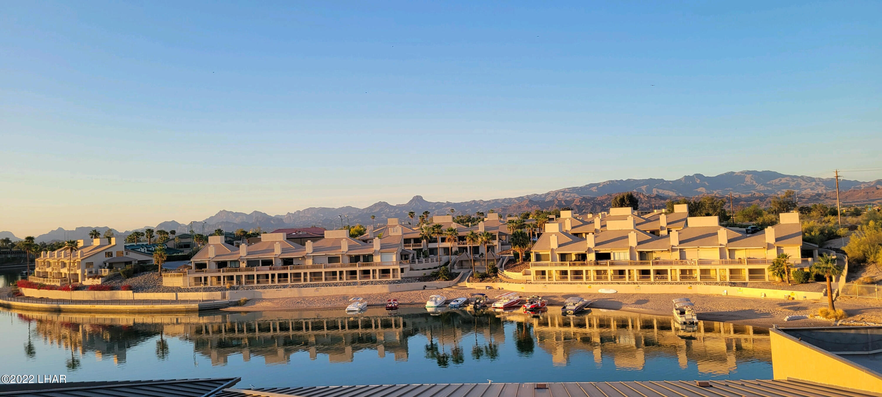 94 London Bridge Road, Unit 507 Lake Havasu City, AZ 86403 - Photo 3 of 13 a view of a lake with a city