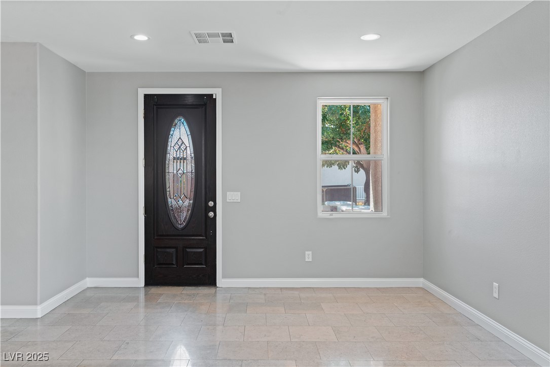 312 Pocono Ranch Avenue North Las Vegas, NV 89031 - Photo 14 of 34 Foyer entrance with recessed lighting, visible vents, and baseboards
