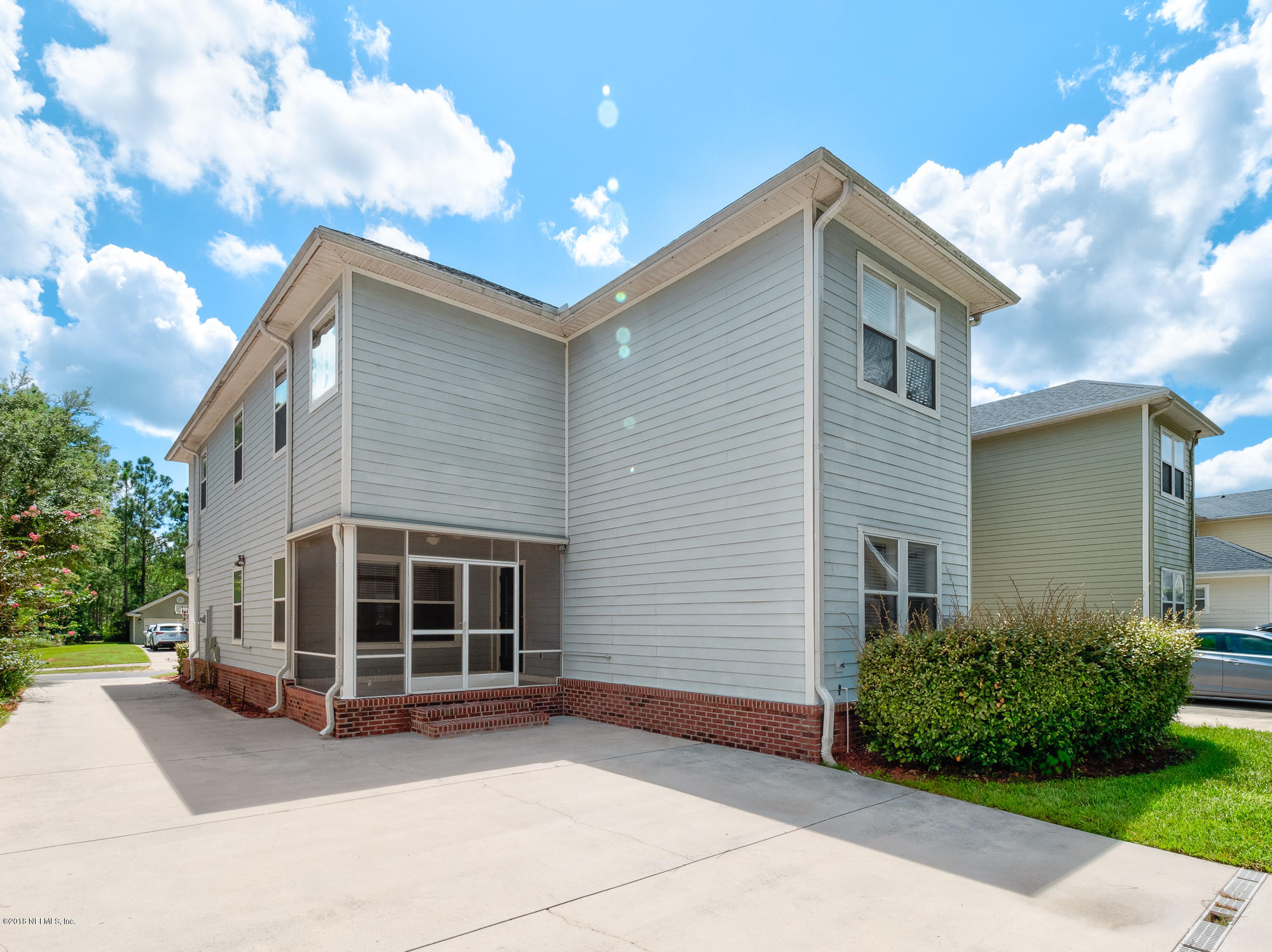 3716 Chasing Falls Road Orange Park, FL 32065 - Photo 29 of 31 a view of a house with a yard