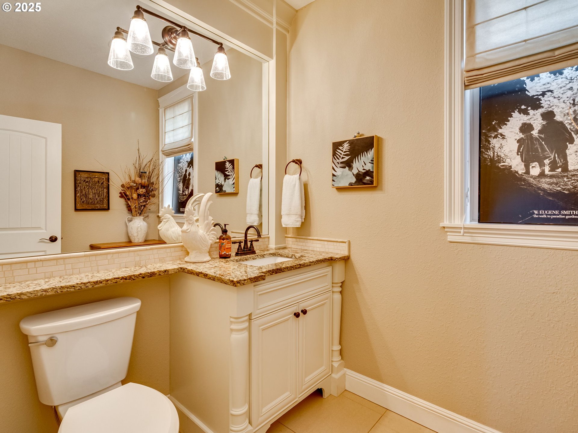 8581 Southeast 19th Avenue Portland, OR 97202 - Photo 17 of 39 a bathroom with a granite countertop sink mirror and toilet