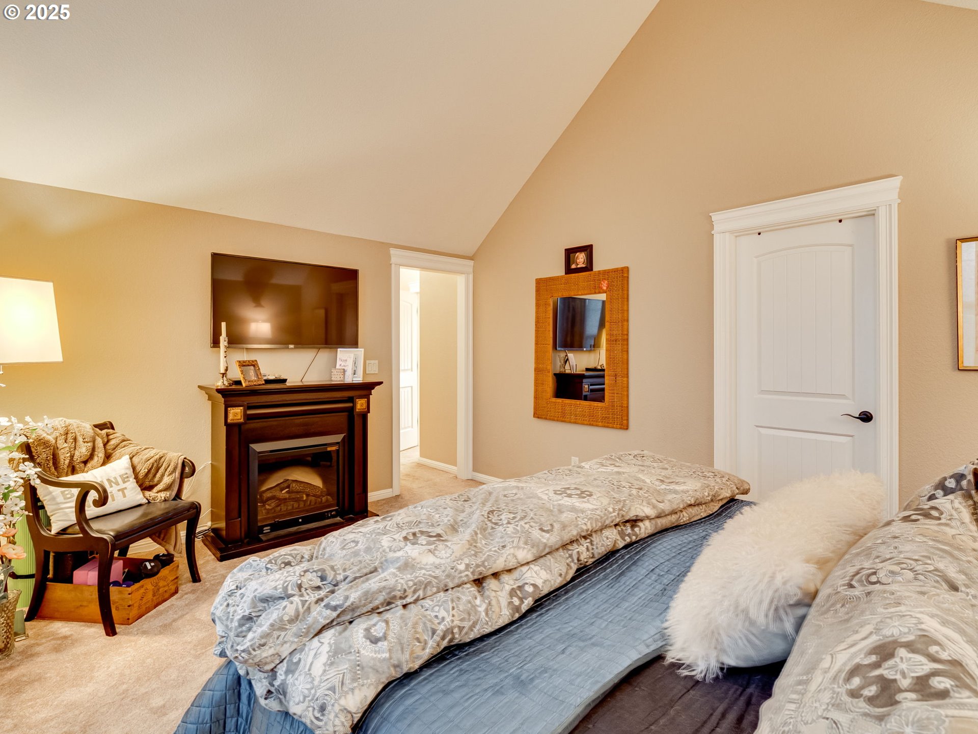 8581 Southeast 19th Avenue Portland, OR 97202 - Photo 19 of 39 a bedroom with a bed and a television