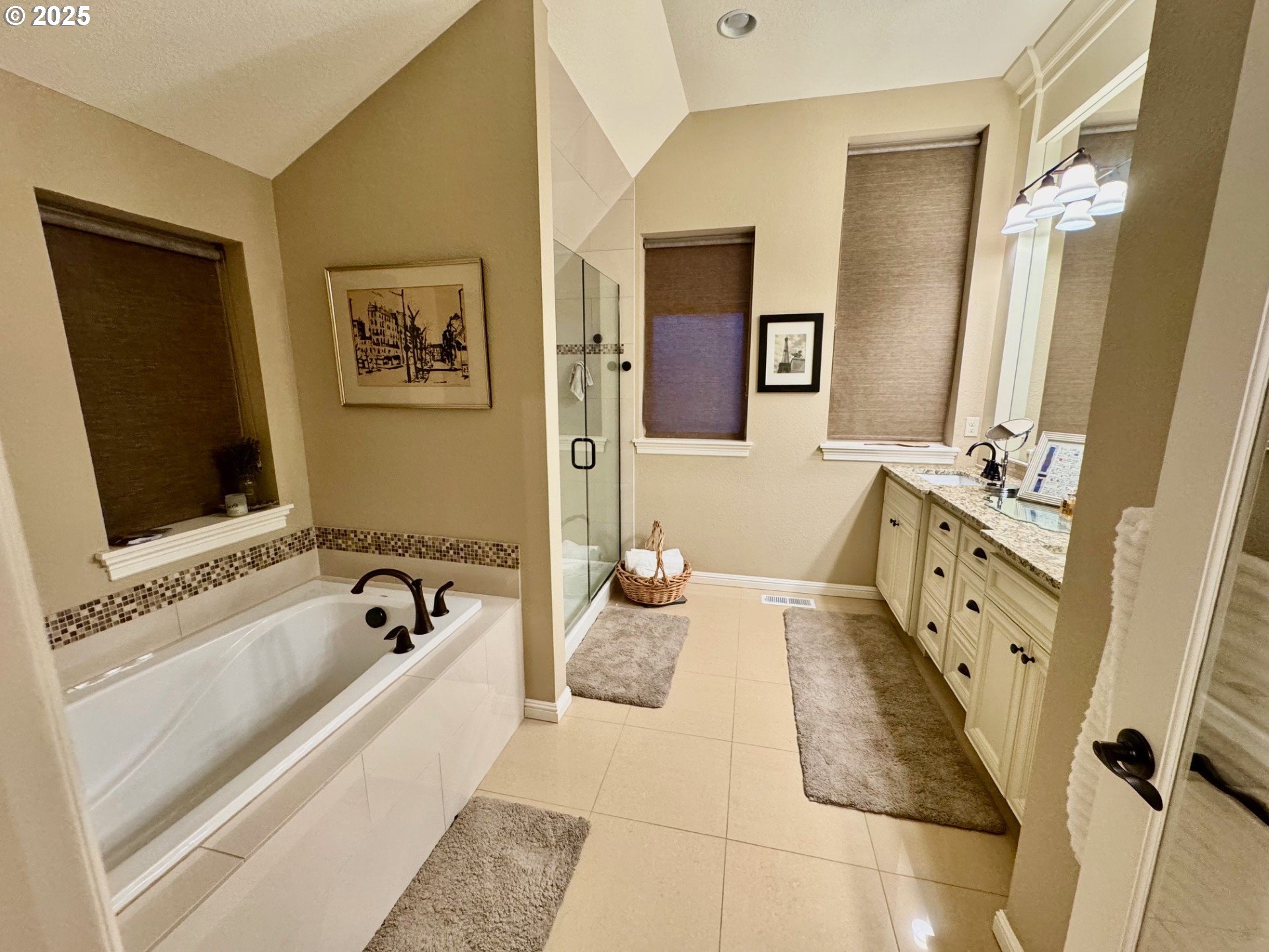 8581 Southeast 19th Avenue Portland, OR 97202 - Photo 22 of 39 a spacious bathroom with a tub sink and mirror