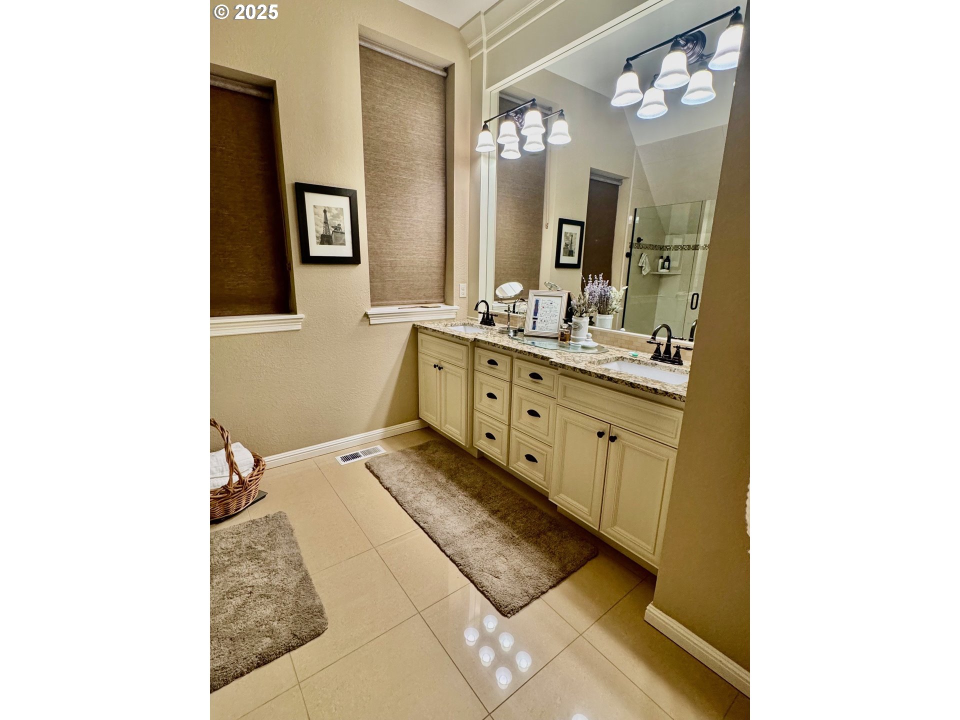 8581 Southeast 19th Avenue Portland, OR 97202 - Photo 25 of 39 a spacious bathroom with a double vanity sink and a mirror