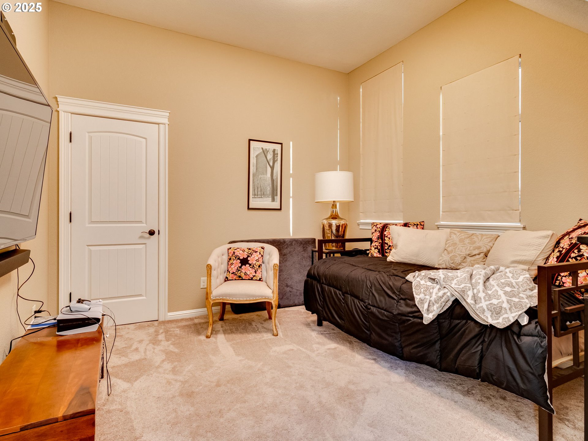 8581 Southeast 19th Avenue Portland, OR 97202 - Photo 26 of 39 a bed room with furniture and a chair