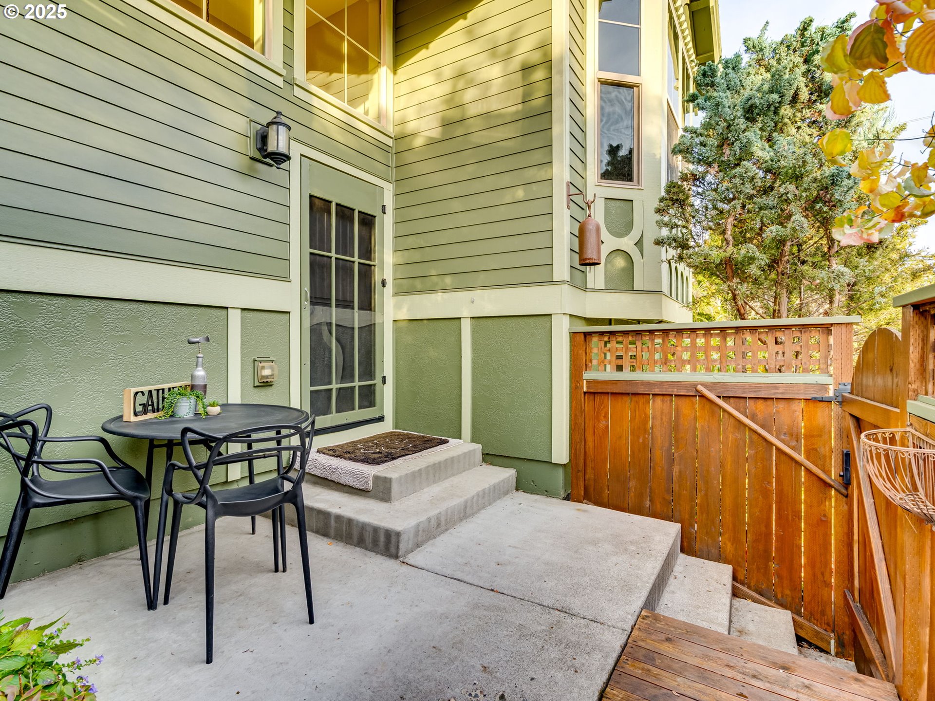 8581 Southeast 19th Avenue Portland, OR 97202 - Photo 36 of 39 a patio with table and chairs