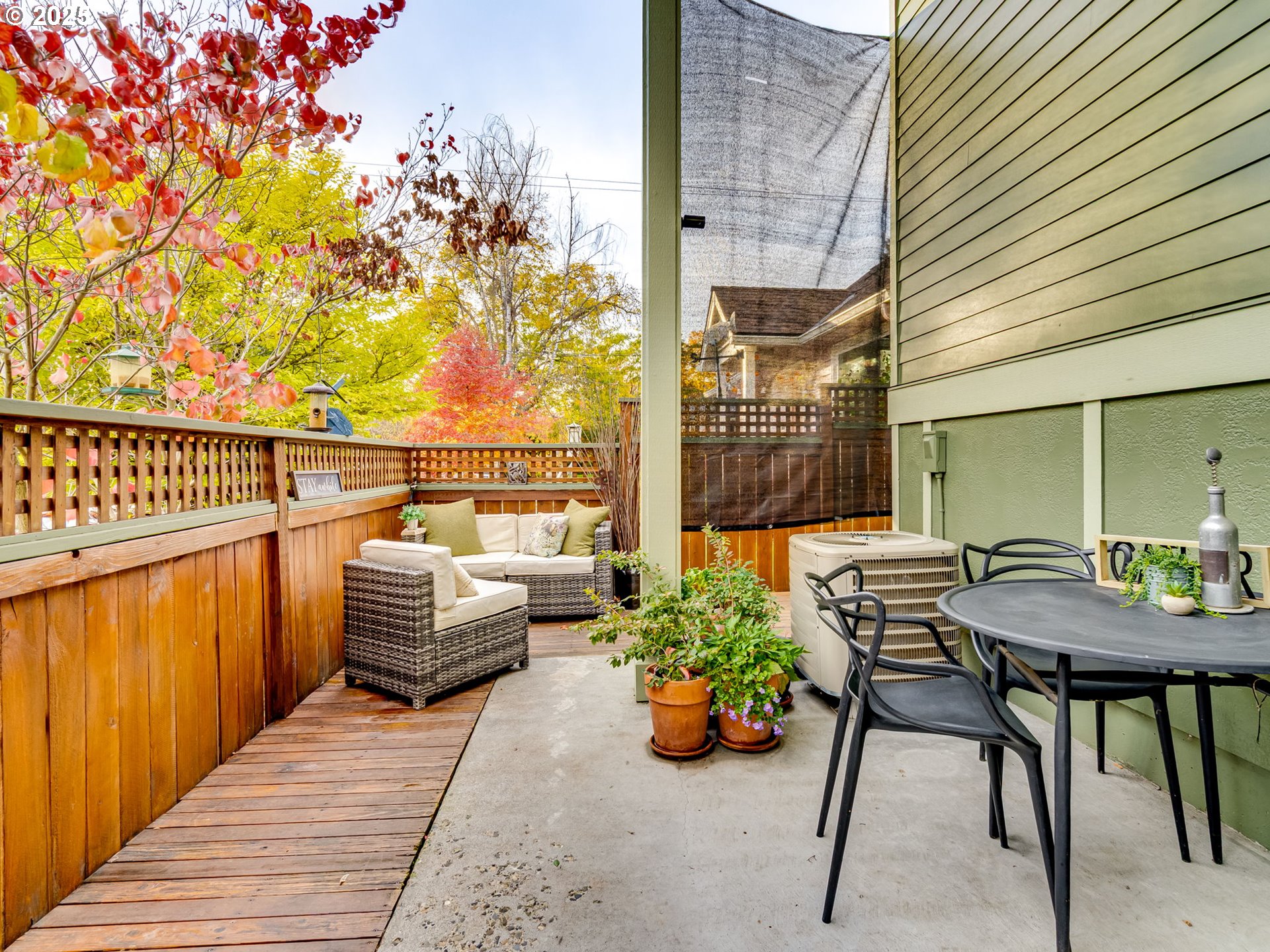 8581 Southeast 19th Avenue Portland, OR 97202 - Photo 37 of 39 a view of a balcony with chairs and a potted plant
