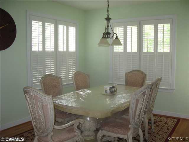 3619 Bailey Farm Road Moseley, VA 23120 - Photo 11 of 12 a view of a dining room with furniture window and outside view