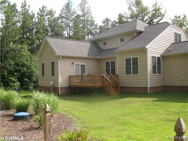 3619 Bailey Farm Road Moseley, VA 23120 - Photo 2 of 12 a view of a house with a balcony