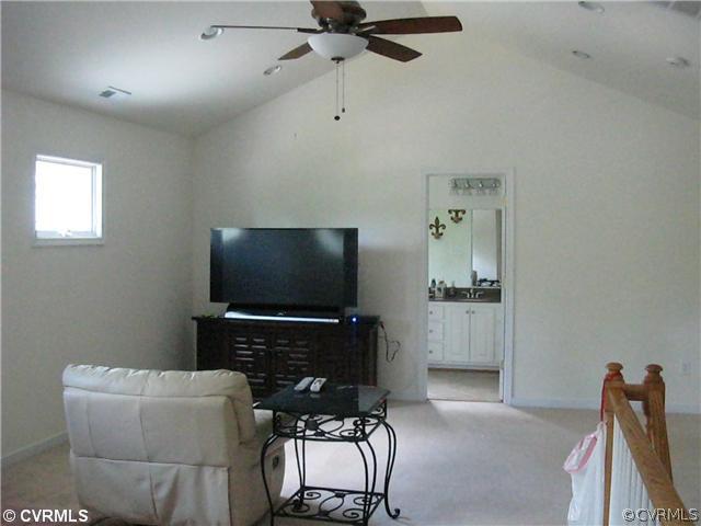 3619 Bailey Farm Road Moseley, VA 23120 - Photo 10 of 12 a living room with furniture and a flat screen tv