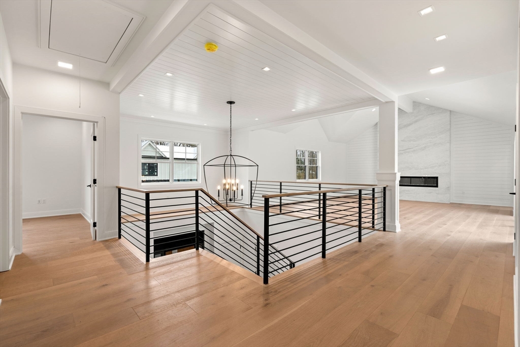 8 Orchard Road, Unit A Gloucester, MA 01930 - Photo 4 of 6 a view of a hallway with stairs
