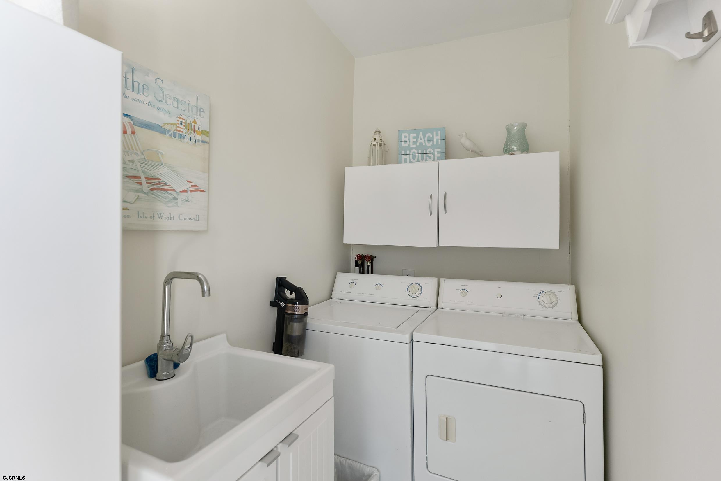 206 East Cardinal Road, Unit 4 Wildwood Crest, NJ 08260 - Photo 10 of 32 a utility room with dryer and washer