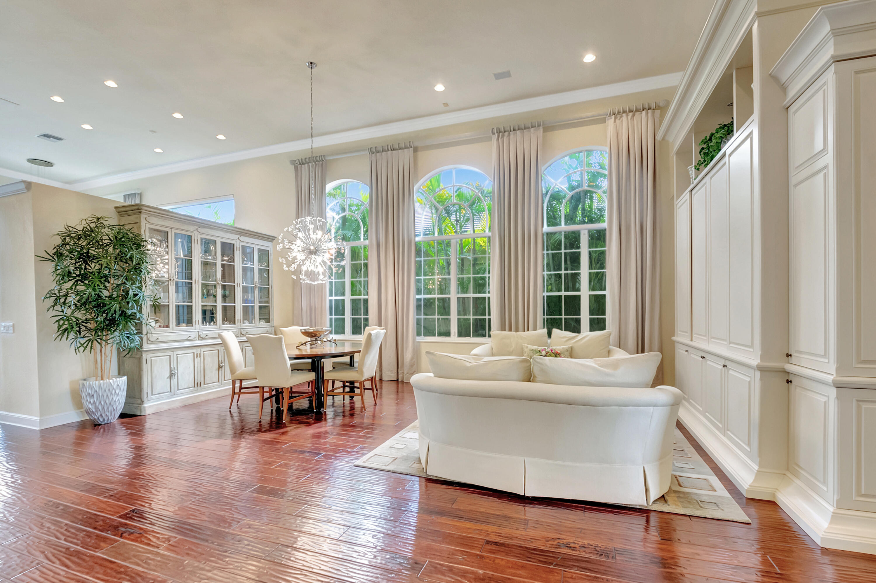 4162 Briarcliff Circle Boca Raton, FL 33496 - Photo 8 of 121 a living room with furniture and wooden floor