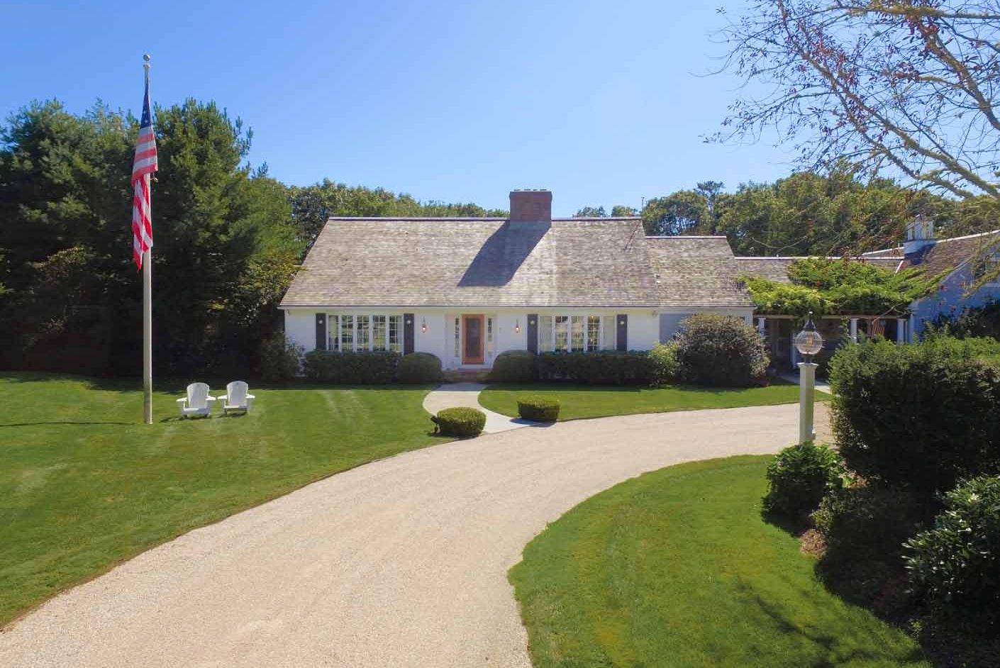 91 Ice Valley Road Osterville, MA 02655 - Photo 3 of 14 a view of a house with a big yard plants and large trees