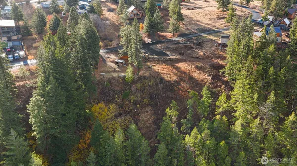 a view of outdoor space with trees all around
