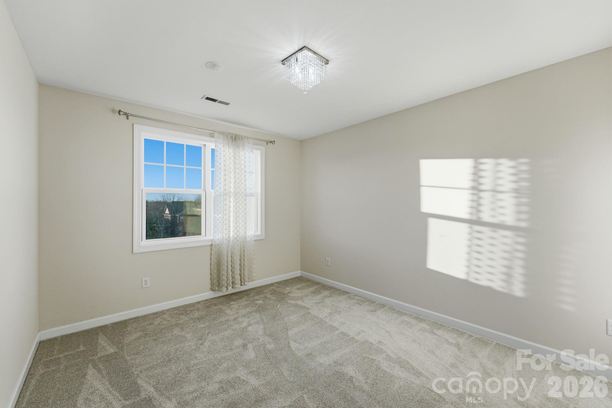 374 Hampton Trail Drive Fort Mill, SC 29708 - Photo 35 of 46 a view of an empty room with a window